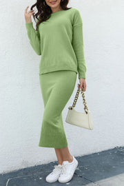 Ribbed knit midi co-ord set in Gum Leaf, featuring a crew neck sweater and midi skirt.