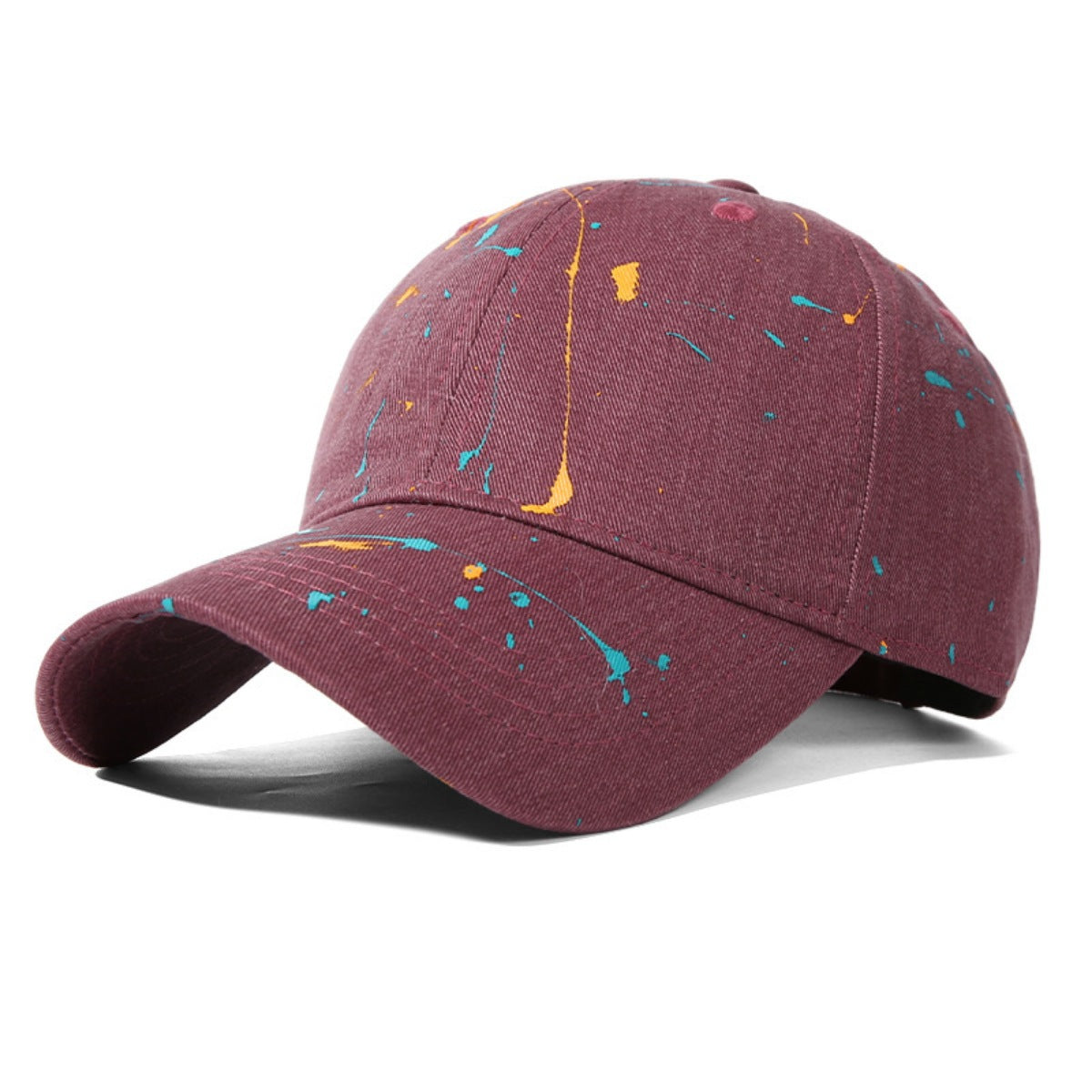 Maroon cotton baseball cap with splatter paint accents in yellow and teal.