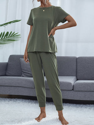 Moss green relaxed-fit tee and jogger loungewear set with crewneck and cuffed ankles.