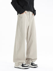 Men's beige wide-leg casual pants with a relaxed fit and side pockets.