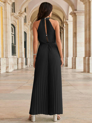 Black halter neckline pleated palazzo jumpsuit with back keyhole detail.