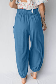 Blue cotton blend jogger pants with smocked waist and pockets