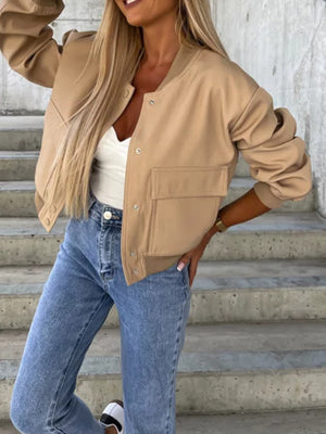 Camel faux leather bomber jacket with sculpted sleeves and chest pockets.