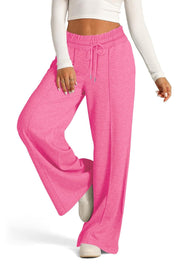 Seamed palazzo lounge trousers in fuchsia pink with drawstring waist and wide leg