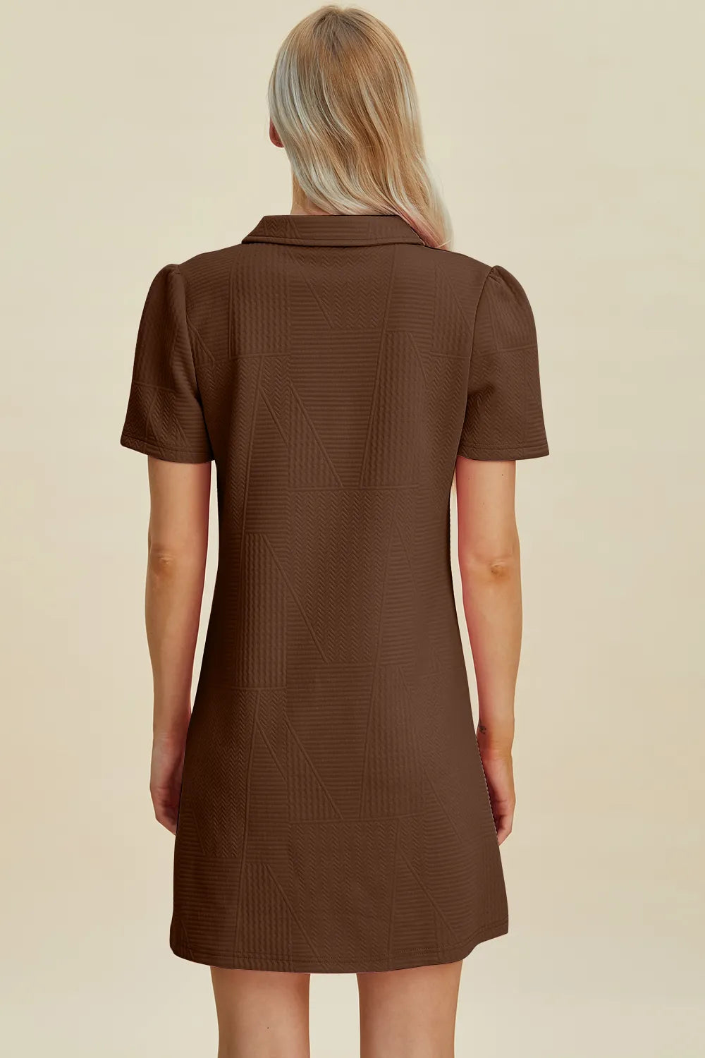 Brown textured mini dress with short sleeves and a collar, shown from the back.