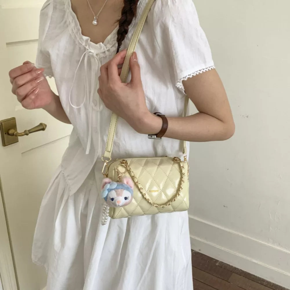 Quilted Chain Strap Crossbody Bag in Yellow, fabric detail