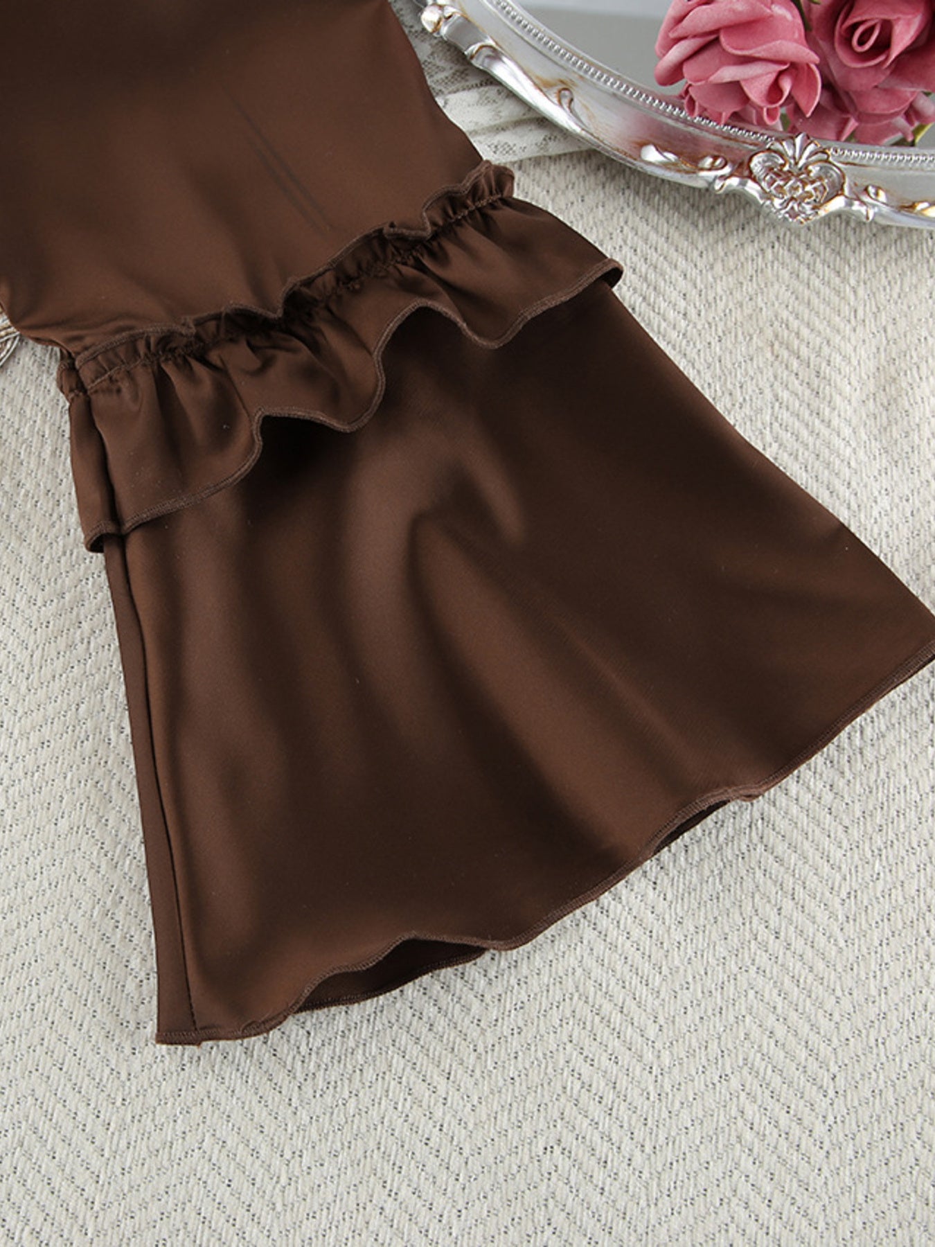 Chocolate ruffled pajama shorts with a tiered ruffle hem detail.