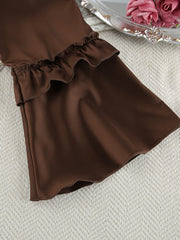 Chocolate ruffled pajama shorts with a tiered ruffle hem detail.