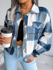 Oversized blue tartan shacket with patch pockets and button front.