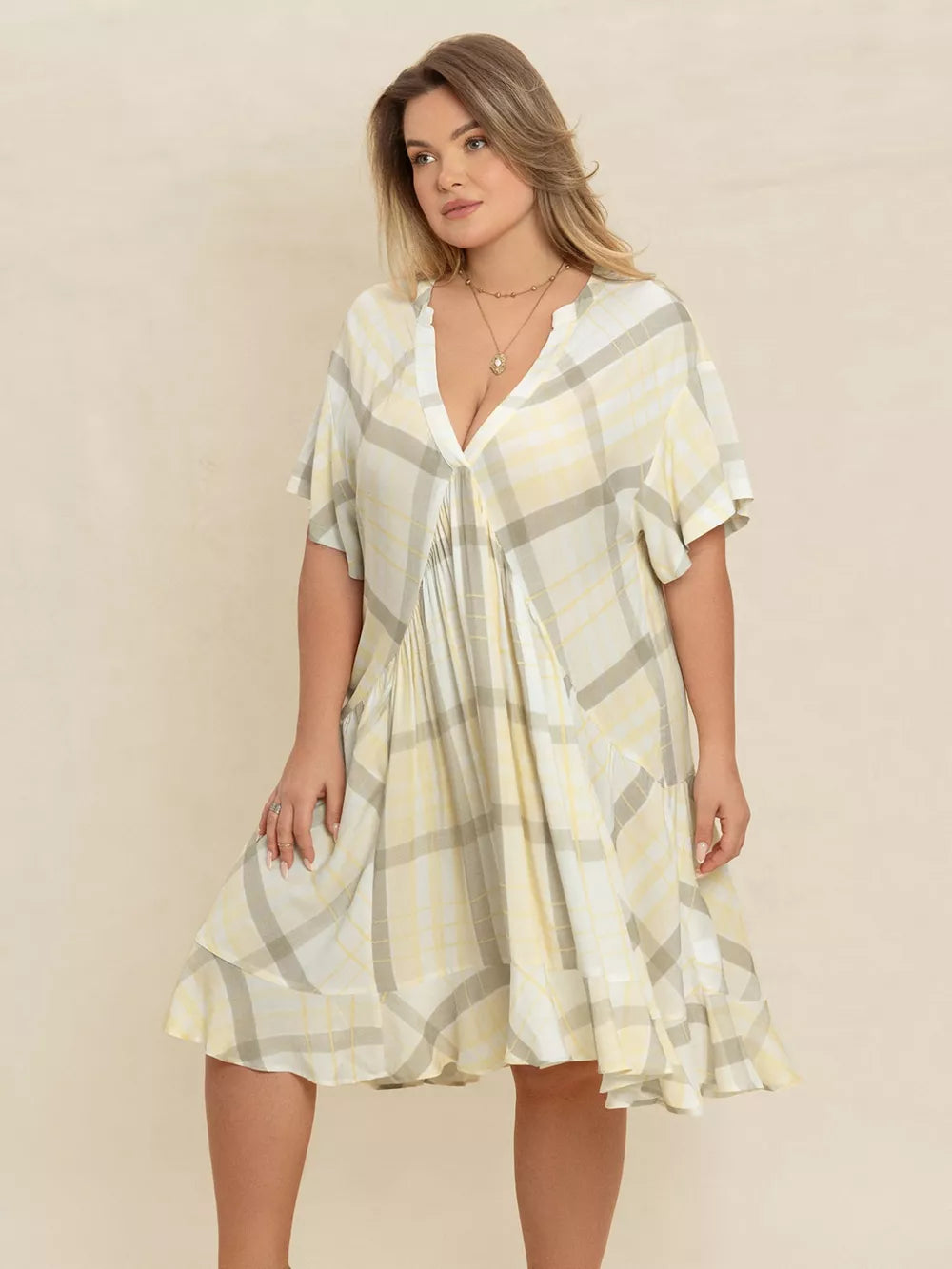 Plus size beige plaid flutter sleeve v-neck midi dress with tiered skirt
