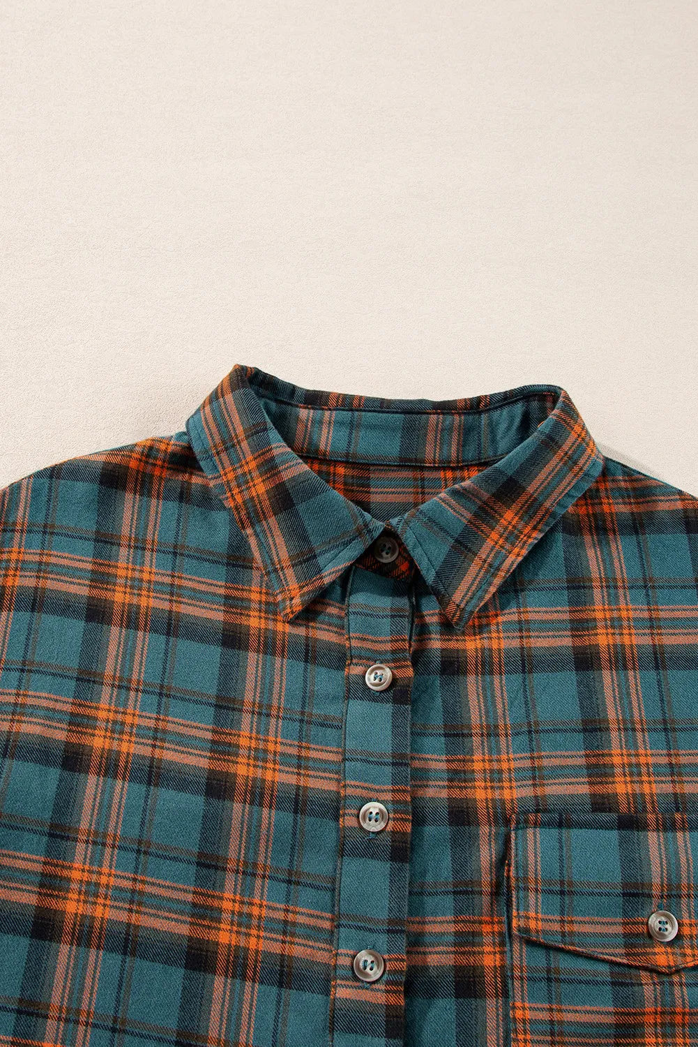Oversized plaid overshirt in French Blue with button front and chest pocket detail.