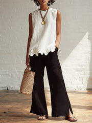 White sleeveless tank top with scalloped hem detail