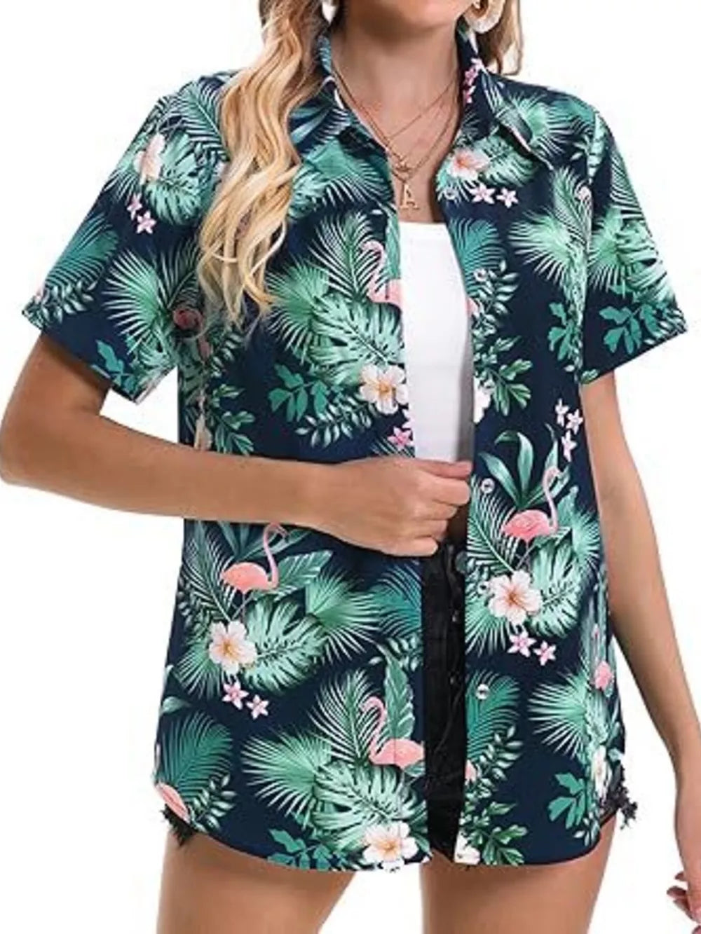 Button-up shirt with tropical flamingo and leaf print in dark blue, short sleeves, open collar.