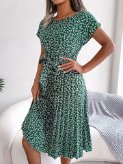 Green floral print midi dress with tie waist and pleated skirt