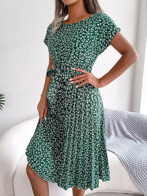 Green floral print midi dress with tie waist and pleated skirt