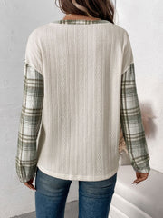 Cream textured henley top with plaid raglan sleeves