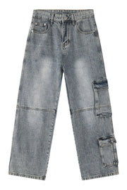 Medium wash denim cargo pants with wide legs and multiple utility pockets.