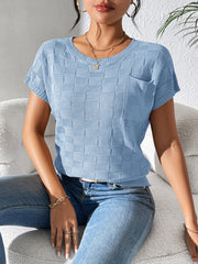 Light blue textured check knit pocket tee with crew neck and short sleeves.