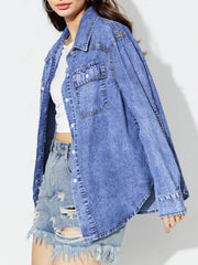 Acid wash denim overshirt in medium blue with two chest pockets and button front.