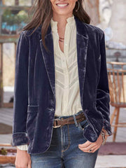 Velvet blazer in peacock blue with rolled cuff detail and buttoned front.