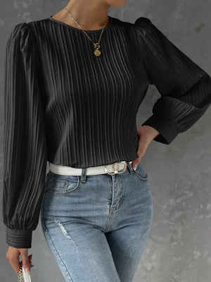 Black pleated sleeve blouse with gathered shoulders and crew neck.