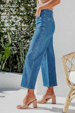 Button-front cropped wide-leg jeans in light blue denim with a high waist.