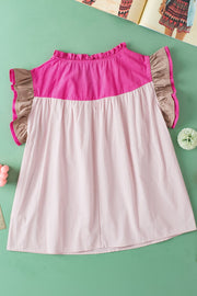 Colorblock ruffle yoke blouse in blush pink and taupe with ruffled sleeves.