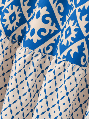 Tiered maxi skirt in blue and white medallion print with ruffled tiers.