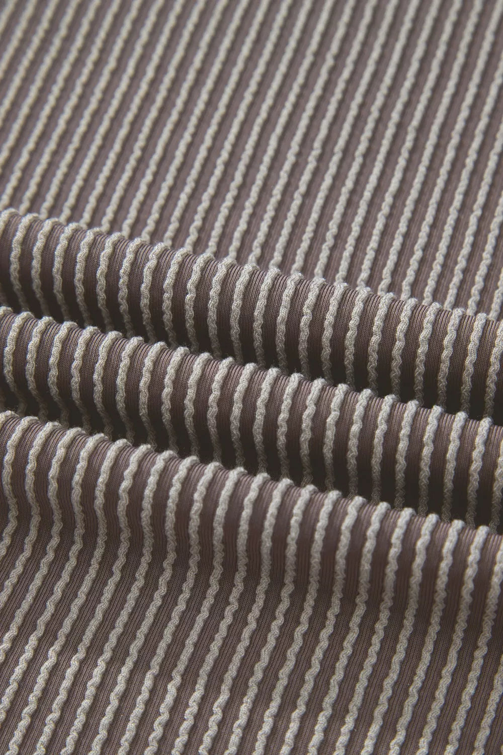 Brown ribbed knit two-piece set with cream stripe detail