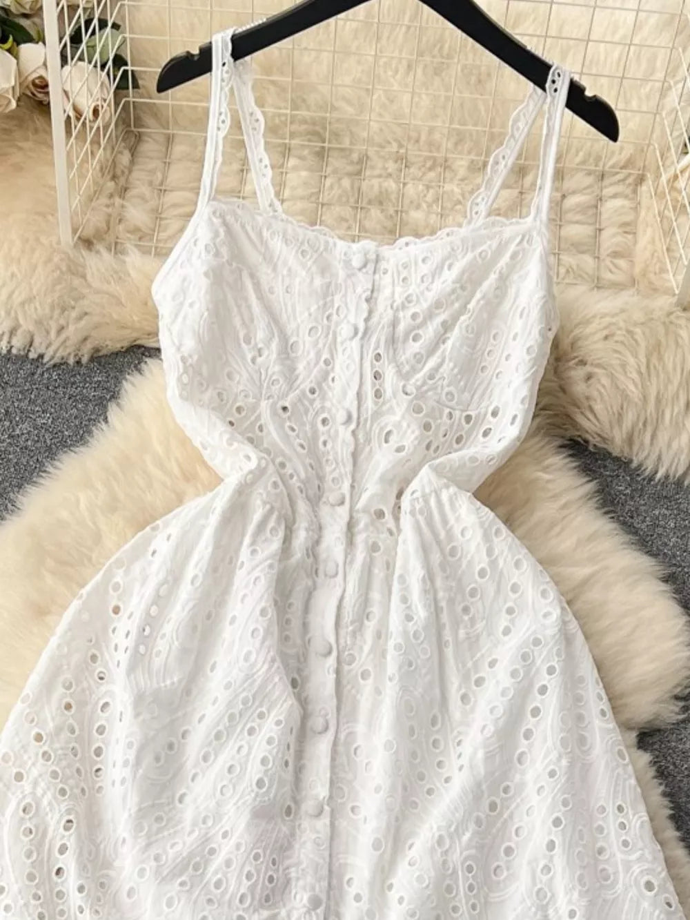 White lace-embroidered cami dress with tiered skirt and button front