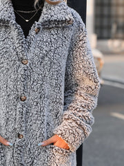 Teddy bear textured button-down coat in grey with brown buttons.