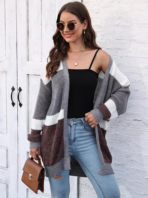 Colorblock knit open cardigan in dark gray, white, and brown stripes.