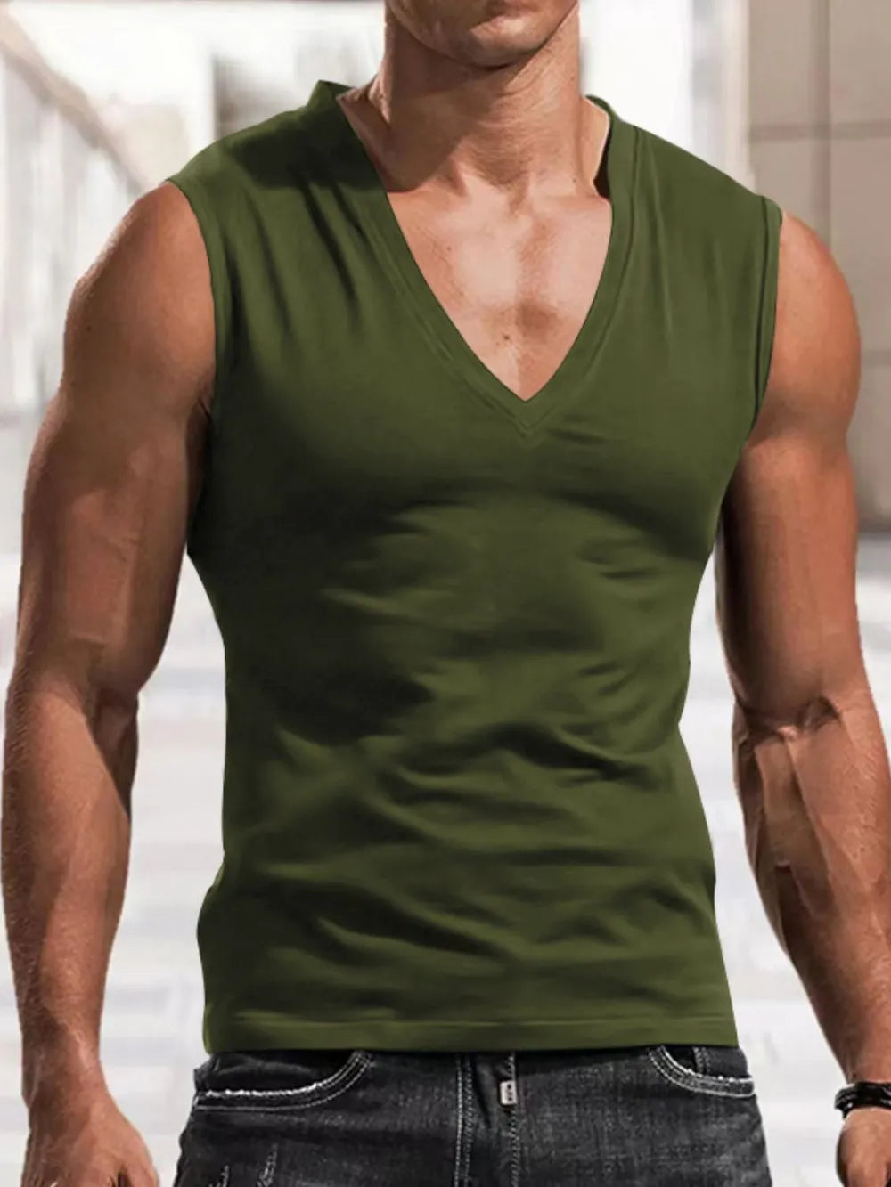 Army green V-neck muscle tank top with a sculpted fit.