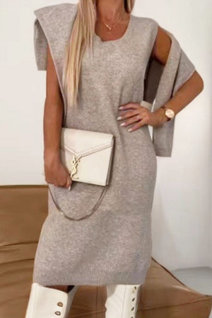 Cozy knit midi dress and matching shrug in mocha, with a relaxed fit and shoulder detail.