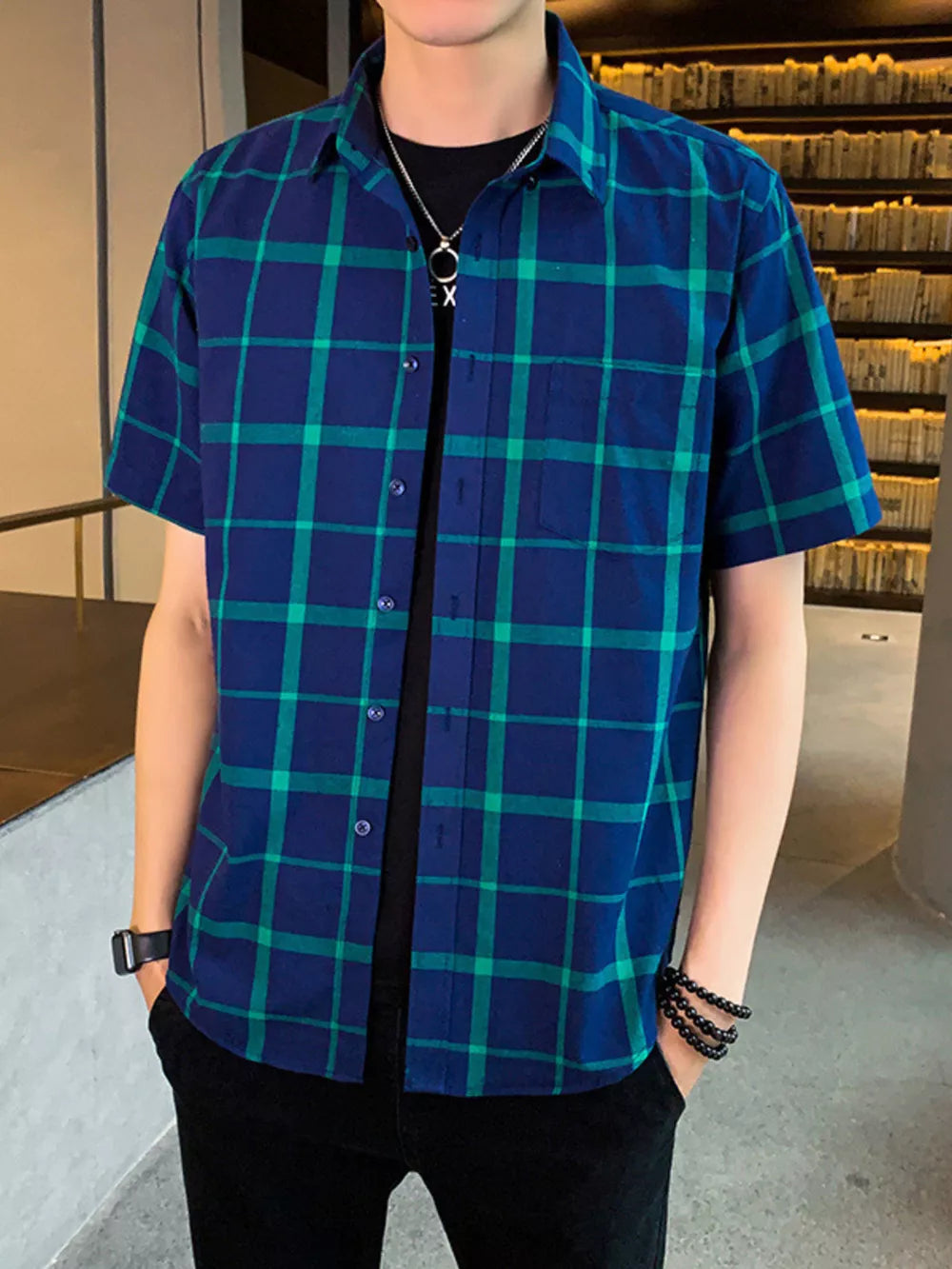 Men's blue and green plaid short sleeve button-down shirt with chest pocket