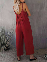 Burgundy gathered bodice wide-leg jumpsuit with spaghetti straps and a V-neck.