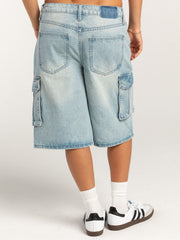 Light blue denim cargo bermuda shorts with buttoned pockets and a relaxed fit.