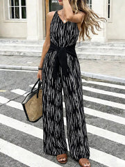 Black abstract print wide-leg jumpsuit with tie waist and V-neck