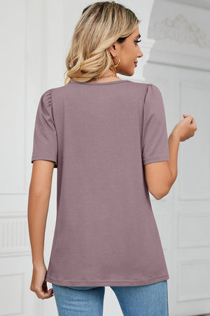 Lilac tee with square neck and sculpted puff sleeves.