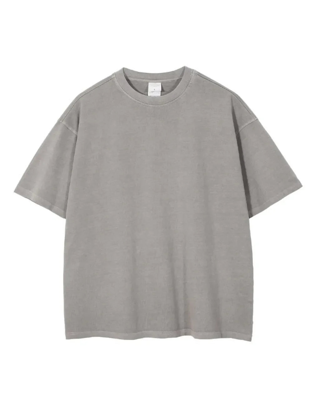 Oversized washed cotton tee in light gray with a relaxed fit and crew neck.