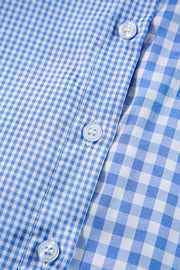 Light blue gingham oversized shirt with patch pocket detail and buttons.