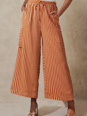 Tangerine striped culottes with cargo pockets and drawstring waist.