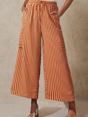 Tangerine striped culottes with cargo pockets and drawstring waist.