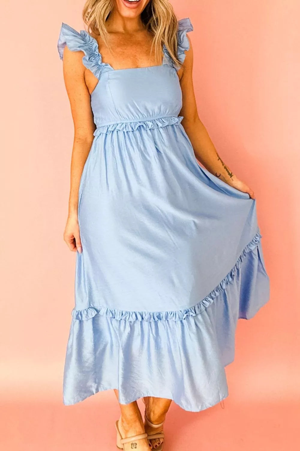 Light blue ruffle-trimmed high waist maternity dress with square neckline and tiered hem.
