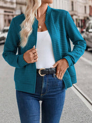 Quilted bomber jacket in French Blue with zip closure and stand-up collar.