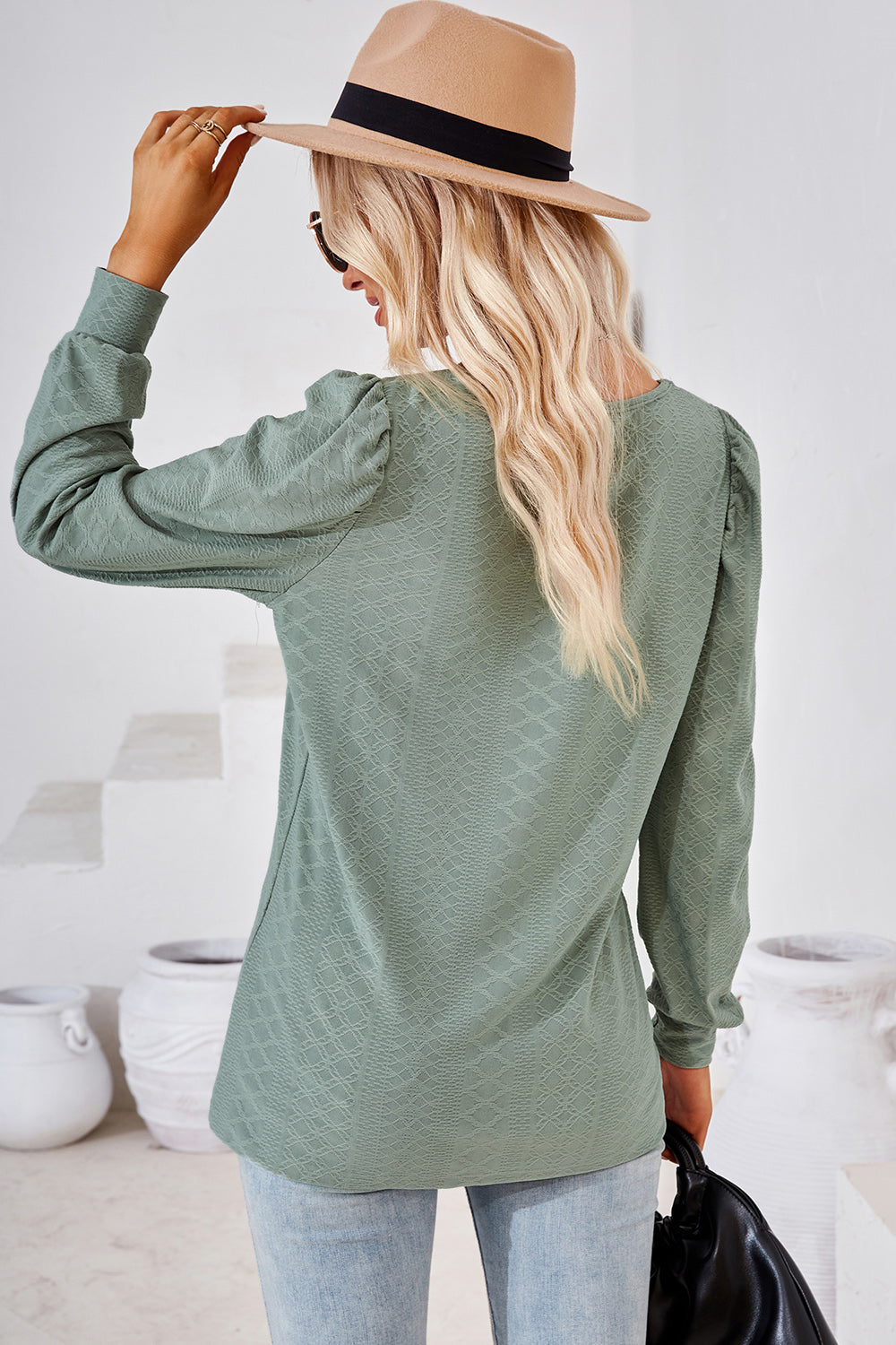 Sage green diamond-textured puff sleeve top with a crew neck.