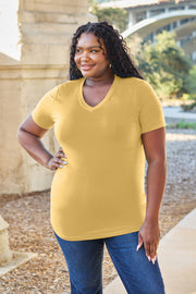 Yellow V-neck pocket tee with short sleeves and a relaxed fit.