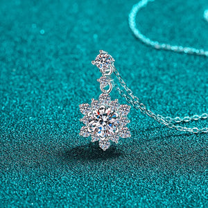 Celestial Bloom Moissanite pendant necklace in silver with a delicate floral design.