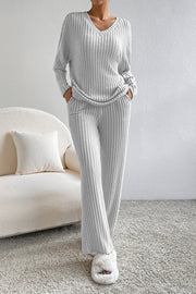 Light Gray ribbed knit lounge set with V-neck top and wide-leg pants.