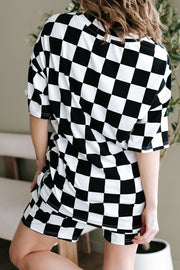 Black and white checkered outfit set with oversized t-shirt and shorts.